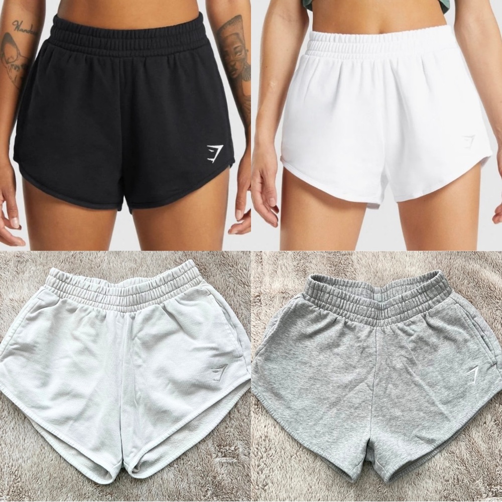 bundle of 4 gymshark sweat shorts size XS 1 black, 1 white, 1 grey/white, 1 grey